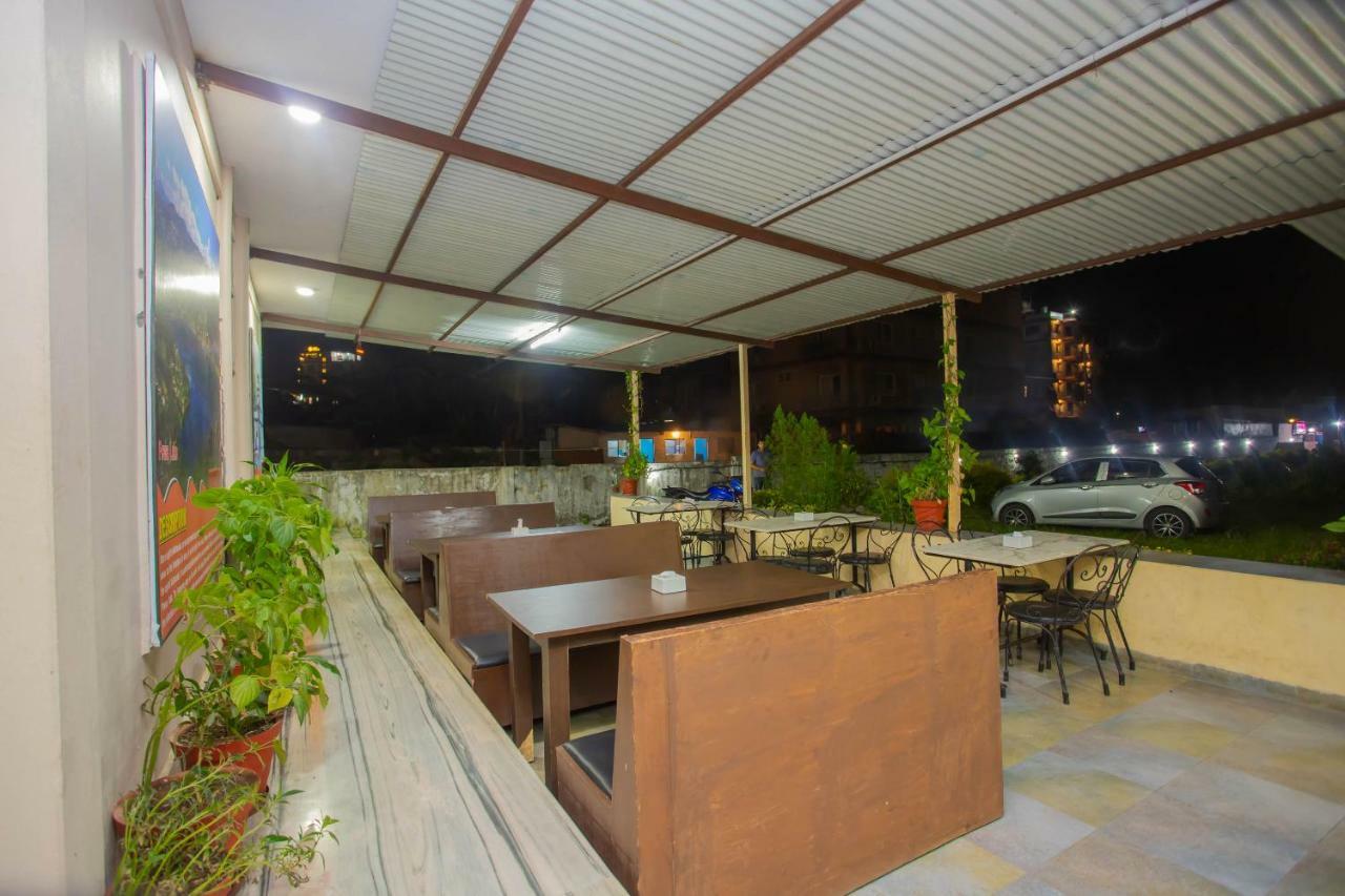 Oyo 575 Api Suites بوكْرا المظهر الخارجي الصورة